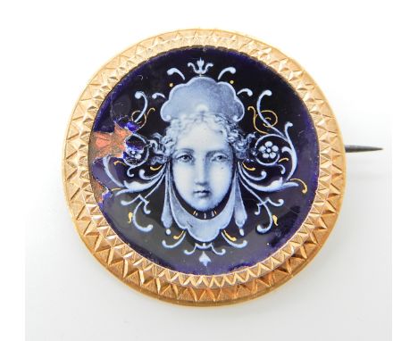 A BRIGHT YELLOW METAL BROOCH WITH A PAINTED ENAMEL PANEL the enamel panel is damaged, but beautifully painted, diameter 2.2cm