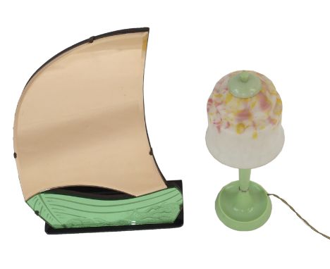 AN ART DECO FRAMELESS NAUTICAL MIRROR depicting a boat, 45cm high and a green Art Deco table lamp, 42cm high (2) Condition Re