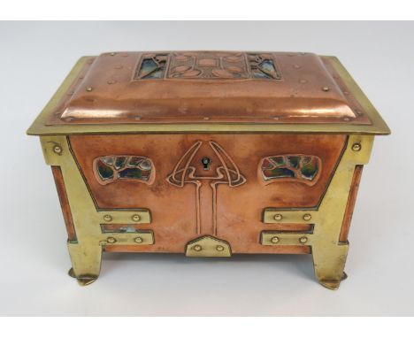 AN ARTS AND CRAFTS COPPER AND BRASS JEWELLERY CASKET with inset enamel panels, possibly Austrian, 11.5cm x 17cm x 11.5 cm Con