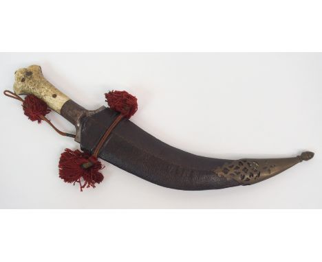 THOMAS EDWARD LAWRENCE, CB, DSO (1888-1935) T.E. SHAW LAWRENCE OF ARABIA AN ARABIAN JANBIYA DAGGER with bone handle, in metal