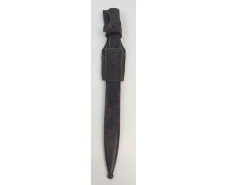 A WWII GERMAN BAYONET maker's mark E.U.F. Horster, the hatched hilt and blade in blued steel, the 25cm long fullered blade st