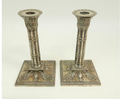 A PAIR OF VICTORIAN SILVER CANDLESTICKS by Harrison Brothers and Howson (Henry Harrison), Sheffield 1892, with removable drip