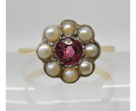 AN 18CT GOLD RUBY AND PEARL RING size M1/2, weight 2.3gms Condition Report: Slight peeling to one of the pearls,  platelets v