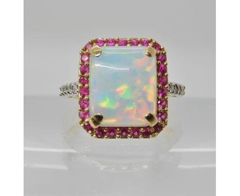 A 14K GOLD OPALITE, DIAMOND AND RUBY RING head size 15.3mm x 13.7mm, finger size N1/2, weight 5.1gms Condition Report: Availa