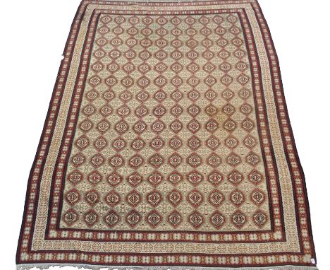 A LIGHT GROUND KILIM RUG with light green and red motifs with matching borders, 310cm x 415cm Condition Report: Available upo