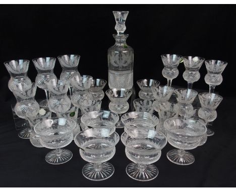 A SUITE OF EDINBURGH CRYSTAL THISTLE SHAPED DRINKING GLASSES including six large wine glasses, 16.5cm high, six smaller wine 