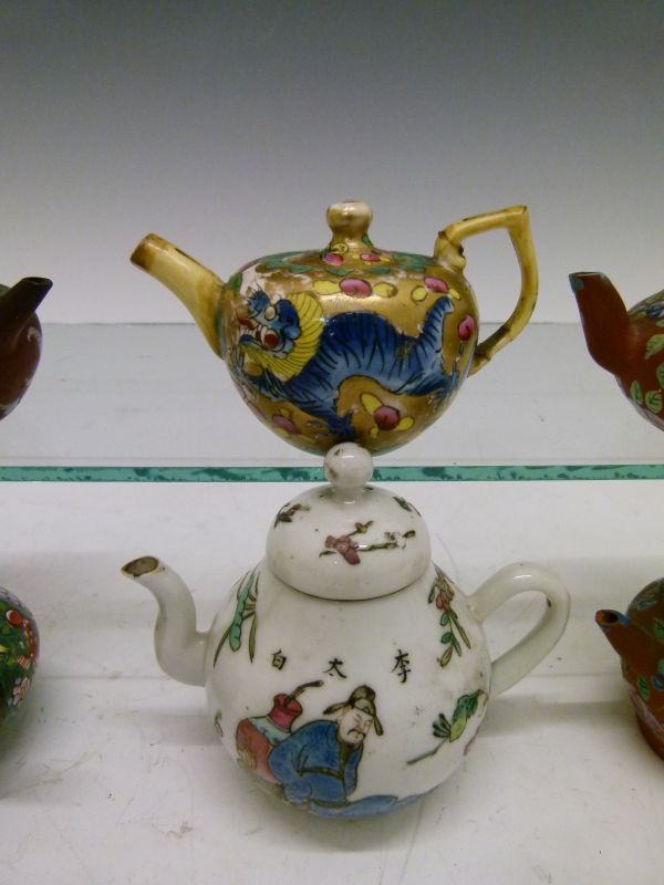 Collection of six Chinese miniature teapots, three being Yixing, each