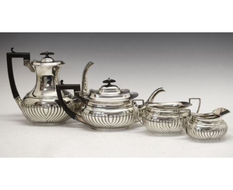 Edward VII silver four piece tea service, each piece with half fluted decoration, makers Cooper Brothers & Sons Ltd, the teap