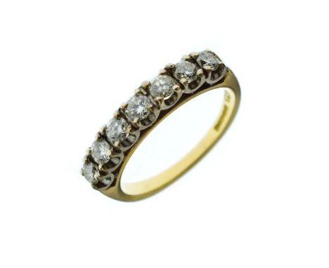 Seven stone diamond half-hoop 18ct gold ring, the uniform brilliant cuts totalling approximately 0.7 carats, size O, 4.4g gro