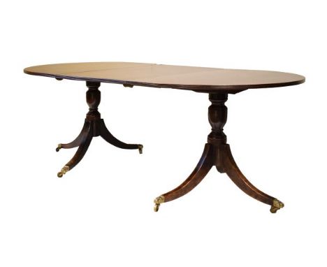 19th Century mahogany 'D' end extending dining table having a reeded edge, fitted one insertion and standing on twin turned p