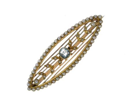 Edwardian aquamarine and seed pearl brooch, stamped '15ct', the oval cut stone flanked by seed pearl set line of leaf motifs,