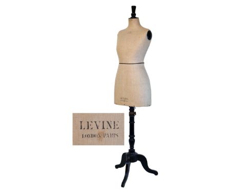 Early 20th Century dressmaker's dummy by Levine of London and Paris, standing on a telescopic ebonised turned pillar and trip