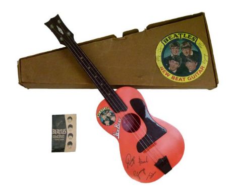 The Beatles - Selcol New Beat Beatles guitar, in original box with instructions/song chart  Condition: The guitar is in good 