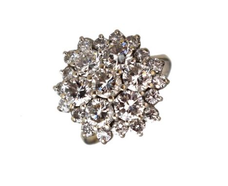 Twenty-five stone diamond cluster ring, the white mount unmarked, the seven principal brilliant cuts totalling approximately 