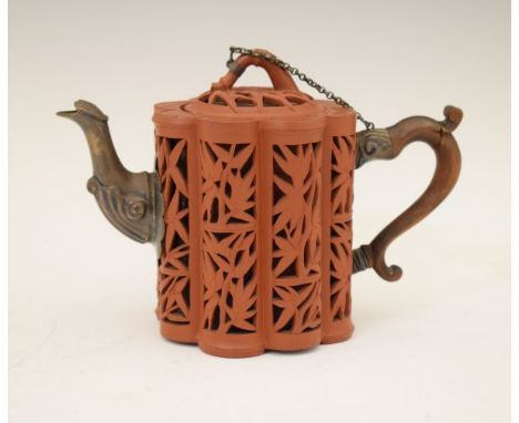 Chinese Yixing octagonal tea pot, 18th Century, modelled with eight reticulated bamboo decorated panels, having an embossed s