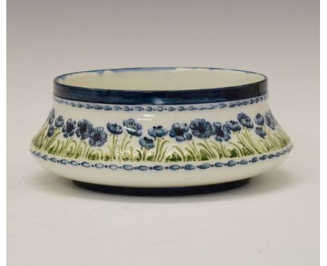 Macintyre 'Blue Poppy' bowl, overall diameter 23cm  Condition: Some light and uniform staining across the interior base of th