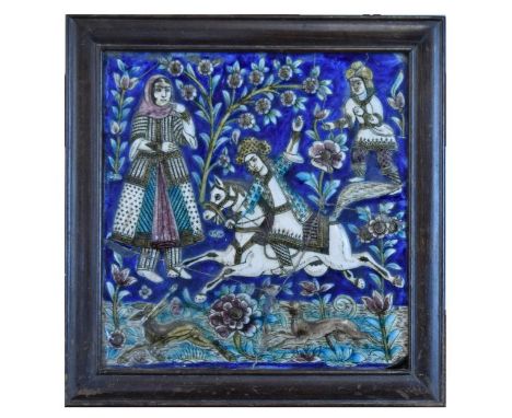 Persian Qajar cuerda seca polychrome decorated pottery panel typically showing a hunting scene on a blue ground, 31cm x 31cm 