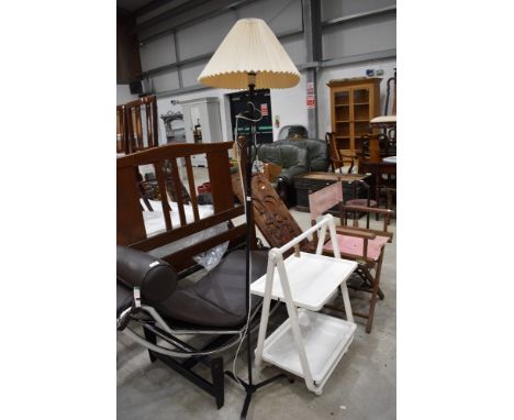 A modern black standard lamp