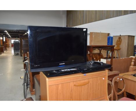 A Samsung 26' TV and DVD player/HDD recorder