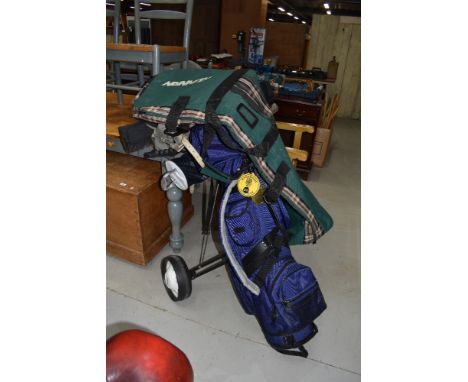 A selection of golf equipment including various balls tees clothes, Set Ladies Howson Derby clubs, trolley, practice club and