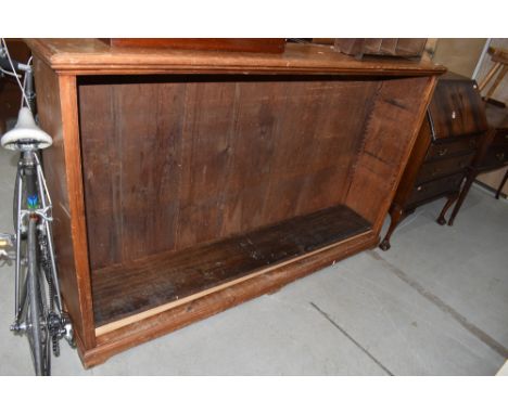 A vintage pine bookcase, of large proportions, width approx. 183cm, height 115cm