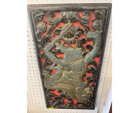 A Maharishi carved panel