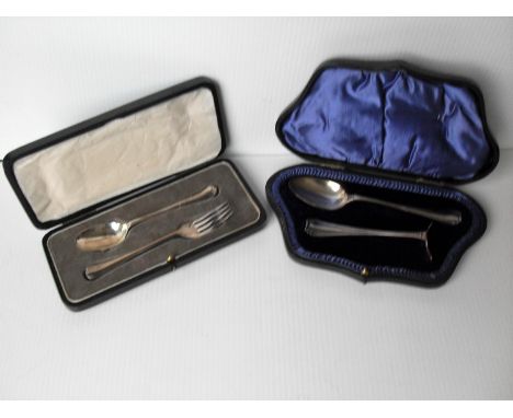 An Edwardian silver cased child's pusher and spoon and a cased rat-tailed spoon and fork all by Atkin Brothers, Sheffield, 19
