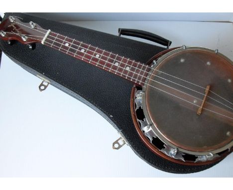 A George Formby cased mandolin, 55cm W and a Lohengrin harp Zither, 51 cm, both in good condition (2) 