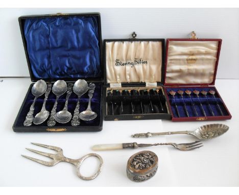 A cased set of six Birmingham silver and enamel cocktail sticks with coronet finials commemorating the 1937 Coronation, anoth