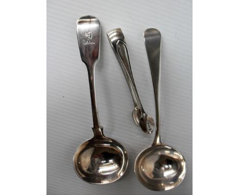 A Victorian crested fiddle pattern silver  ladle by Robert Williams & Sons, Exeter, 1847, a George III silver ladle by Willia