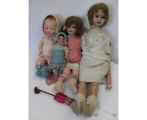 Four Armand Marseille bisque headed dolls with composite body, stamped: A.M. Germany 351.14.K (x2); 390.A.510N; 1916 3 (4) 