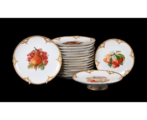 A BERLIN (K.P.M.) PART DESSERT SERVICEEARLY 20TH CENTURY painted with various fruits and currants, within moulded gilt rocail