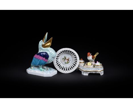 A HEREND PORCELAIN MODEL OF A PELICANMODERNGreen scale, factory marks, 21.5cm high; a modern Herend inkwell, a bird with nest