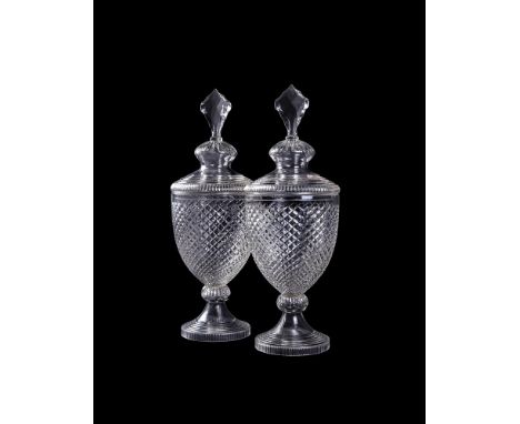 A PAIR OF CONTINENTAL CUT-GLASS URN-SHAPED BONBONIERES AND COVERSCIRCA 1900Hob-cut and with facetted stoppers57cm highConditi