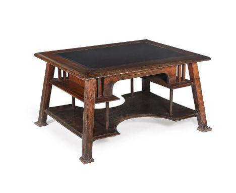 AN ARTS AND CRAFTS OAK WRITING TABLE CIRCA 1900, POSSIBLY AMERICAN With leather inset top, arrow moulded uprights 77cm high, 