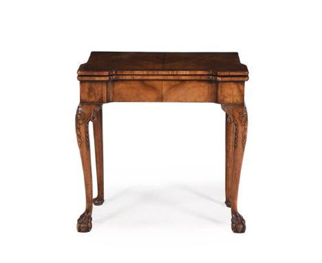 A WALNUT AND CROSSBANDED CONCERTINA ACTION CARD TABLE IN IRISH GEORGE II STYLE, LATE 19TH OR EARLY 20TH CENTURY 70.5cm high, 