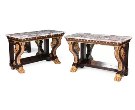 A PAIR OF SIMULATED ROSEWOOD AND PARCEL GILT CONSOLE TABLES IN REGENCY STYLEEARLY 20TH CENTURYEach with a marble top above th