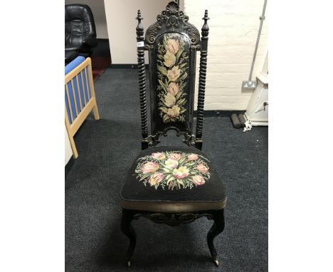 A 19th century floral tapestry side chair on cabriole legs with brass castors, width 50 cm 