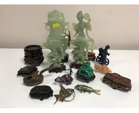 A tray of Chinese and Eastern carvings and collectables including jade carvings on stands, Lapis Lazuli figure, malachite Bud