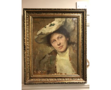 Simon Glucklich (1863-1943) : A portrait of a lady wearing a white bonnet, oil on canvas, signed, 34 cm x 44.5 cm, framed. CO