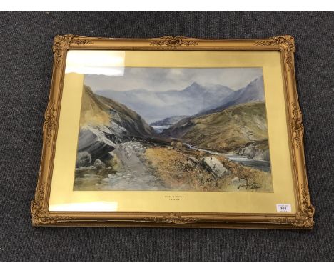 Thomas Swift Hutton (c.1865-1935), Autumn in Glenogle, a shepherd driving sheep through a valley, watercolour, 54cm by 40cm, 