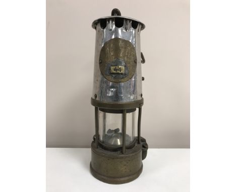 An Eccles Protector Lamp & Lighting Company miner's lamp numbered 44 