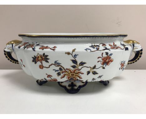 A Royal Worcester gilded planter with elephant twin handles, width 41 cm.