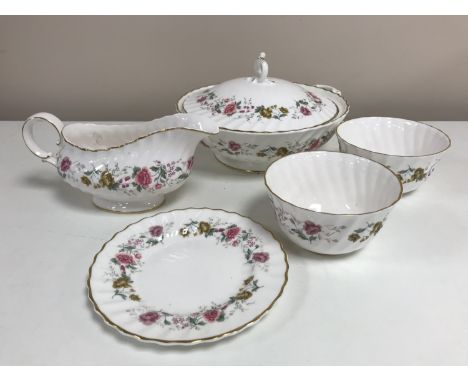 A Royal Doulton tea and dinner service - Rosell pattern. (84)