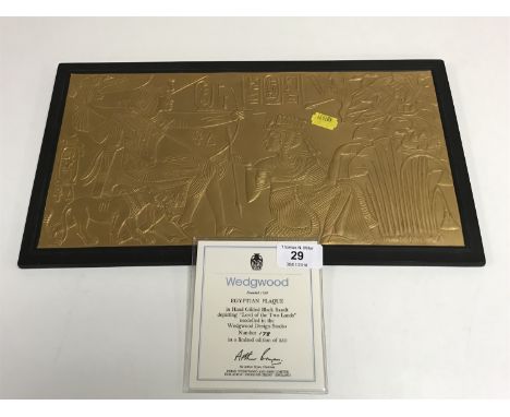 A Wedgwood Egyptian plaque in hand gilded black basalt depicting Lord of the Two Lands, limited edition number 178/250, 39 cm