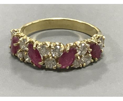 An 18ct gold ruby and diamond ring