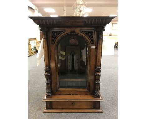 A Victorian Polyphon, in walnut case, together with fifty discs and winding handle. CONDITION REPORT: Disc diameter 50 cm. Ca