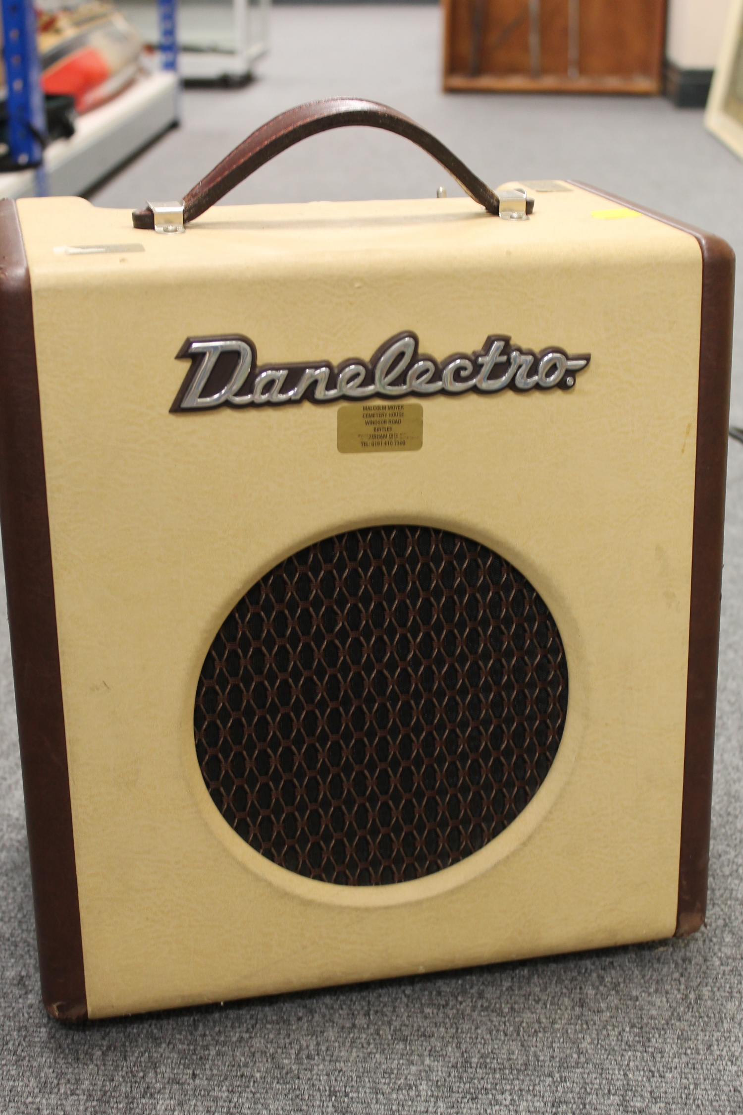A vintage Danelectro amplifier 'Nifty Seventy', together with music stands, condenser microphone
