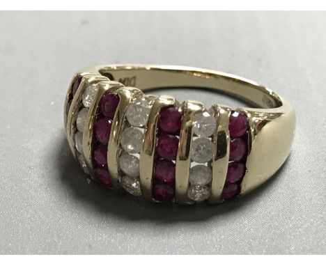 A 9ct gold ruby and diamond set ring, size N/O, 5g.