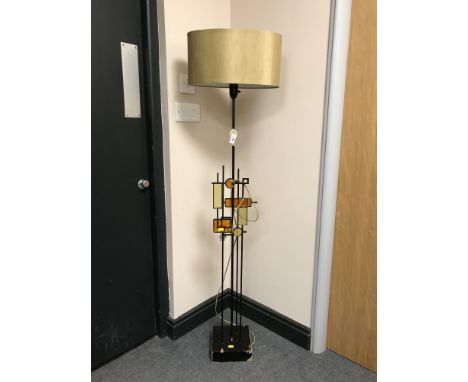 Designed by Svend Aage Holm Sorensen - a rare floor lamp, black iron and lacquered wood with mosaics in amber and yellow glas